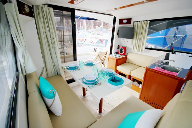 Spacious lounge area of the luxury yacht with ocean views
