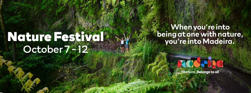 Hikers exploring a lush levada trail during the Madeira Nature Festival 2025, a top nature event in Madeira in October.