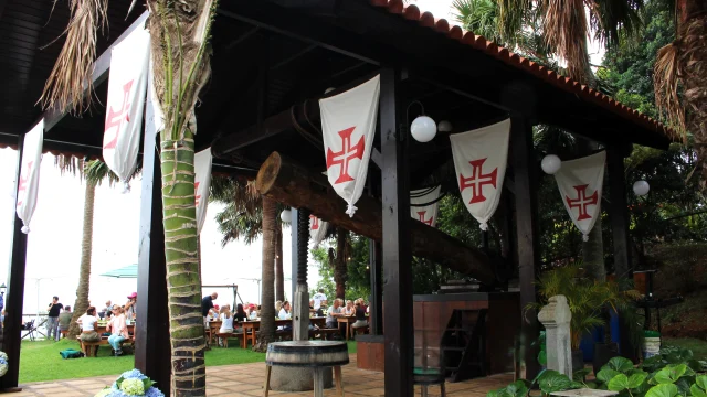 Decorated wine press (lagar) at Madeira Wine Harvest, showcasing traditional symbols and harvest celebration.