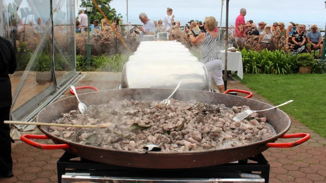 Traditional Madeira dishes: carne de vinho e alhos, espetada, black scabbardfish, and tuna served at wine harvest lunch.