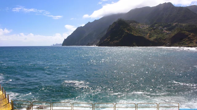 Promenade by the sea in Porto da Cruz with ocean views.