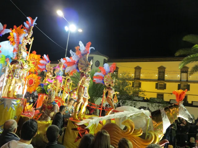 Illuminated allegorical float during the Madeira Carnival Parade in Funchal at night